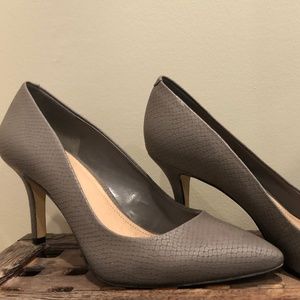 Pointy toe snakeskin stilletos